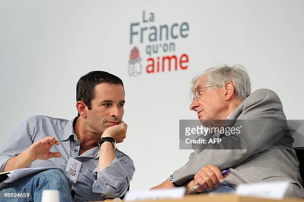France's opposition Socialist Party spokesman Benoit Hamon talks to French left wing Republican and Citizen Movement leader Jean-Pierre Chevenement...
