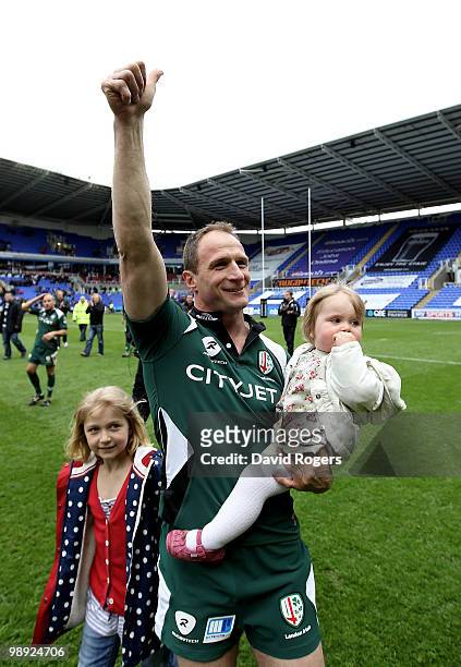 Mike Catt, of London Irish, with his two daughters Evie and Erin, waves to the crowd after his final match after the Guinness Premiership match...