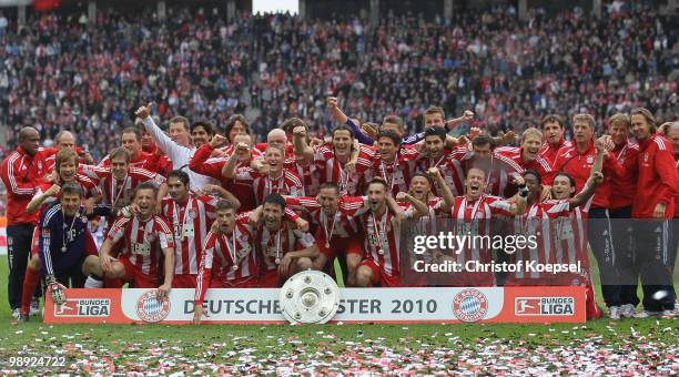 Bayern poses with the German Champions trophy after winning 3-1 the Bundesliga match between Hertha BSC Berlin and FC Bayern Muenchen at Olympic...