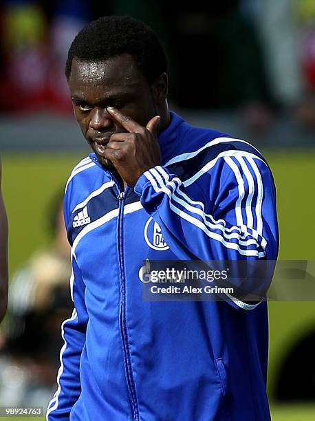 Gerald Asamoah of Schalke wipes away his tears after the Bundesliga match between FSV Mainz 05 and FC Schalke 04 at the Bruchweg Stadium on May 8,...