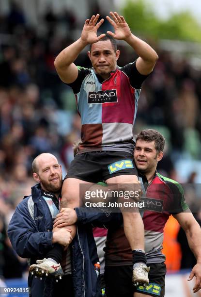 Tani Fuga of Harlequins is carried off by his team mates after his last game during the Guinness premiership match between Harlequins and Sale Sharks...