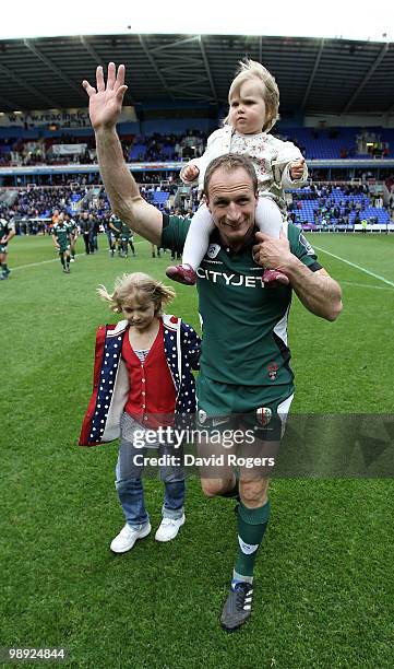 Mike Catt, of London Irish, with his two daughters Evie and Erin, waves to the crowd after his final match after the Guinness Premiership match...