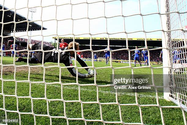 Goalkeeper Manuel Neuer of Schalke saves a penalty of Miroslav Karhan of Mainz during the Bundesliga match between FSV Mainz 05 and FC Schalke 04 at...