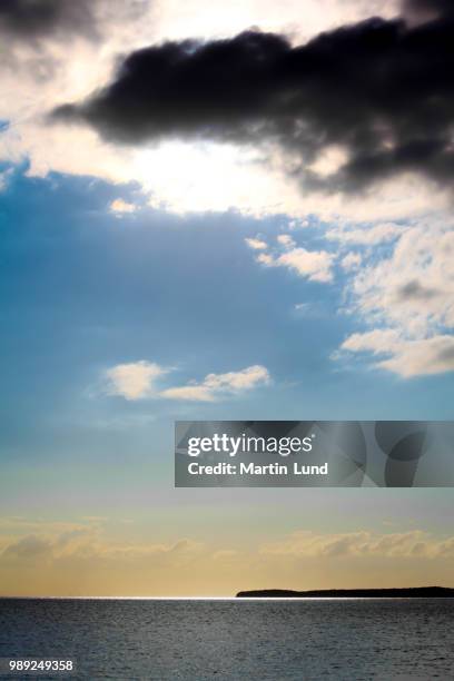 the tip of inhaca island under the clouds - inhaca island stock pictures, royalty-free photos & images