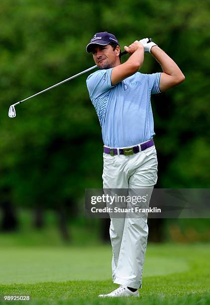 Steve Webster of England plays his approach shot on the eighth hole during the third round of the BMW Italian Open at Royal Park I Roveri on May 8,...