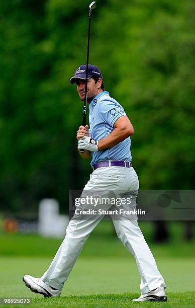 Steve Webster of England plays his approach shot on the eighth hole during the third round of the BMW Italian Open at Royal Park I Roveri on May 8,...