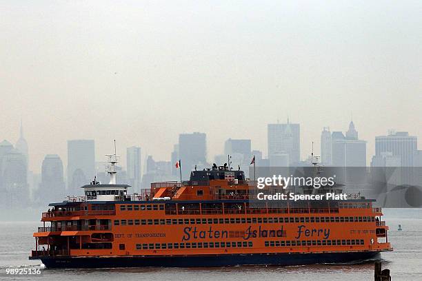 Staten Island Ferry heads towards Manhattan following the crash of another ferry into a dock in the city's borough of Staten Island on May 8, 2010 in...