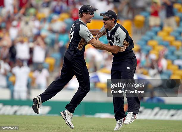 Martin Guptil and Ross Taylor of New Zealand celebrate catching Abdur Rehman of Pakistan to win the match during the ICC World Twenty20 Super Eight...