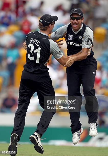 Martin Guptil and Ross Taylor of New Zealand celebrate catching Abdur Rehman of Pakistan to win the match during the ICC World Twenty20 Super Eight...