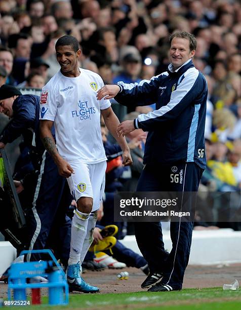 Leeds manager Simon Grayson shares a joke with Jermaine Beckford of Leeds during the Coca Cola League One match between Leeds United and Bristol...