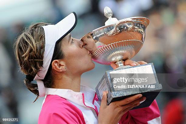 Spain's Maria Jose Martinez Sanchez kisses the trophy after winning the WTA Rome Open on May 8, 2010. Martinez Sanchez defeated Serbia's Jelena...