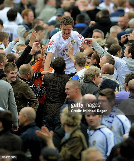 Shane Lowry of Leeds is carried off the pitch after the Coca Cola League One match between Leeds United and Bristol Rovers at Elland Road on May 8,...