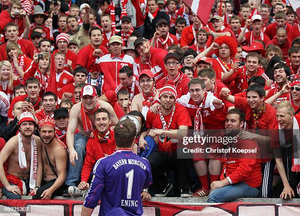 Goalkeeper Michael Rensing of Bayern celebrates together with fans winning the German Champions trophy with the fans after winning 3-1 the Bundesliga...