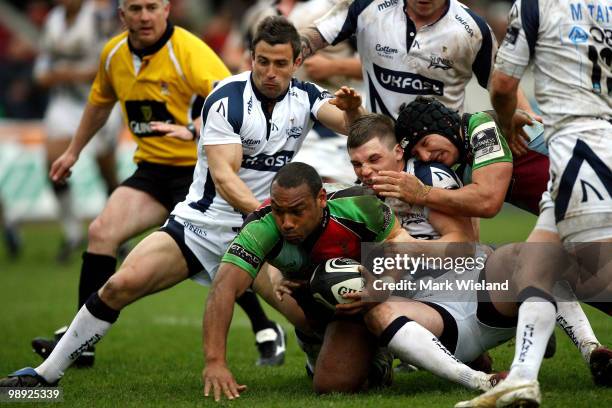 Jordan Turner-Hall of Harlequins is tackled during the Guinness premiership game between Harlequins and Sale Sharks at The Stoop on May 8, 2010 in...