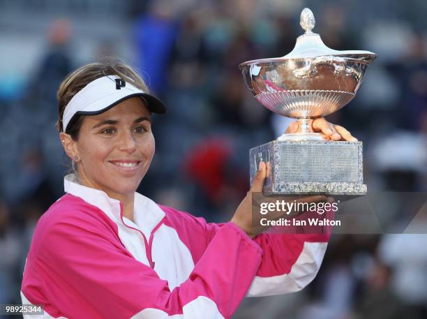 María José Martínez Sánchez of Spain celebrates with the trophy after winning against Jelena Jankovic of Serbia during the Final of the Sony Ericsson...