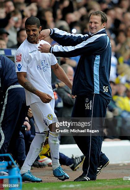 Manager Simon Grayson shares a joke with winning goalscorer Jermaine Beckford of Leeds during the Coca Cola League One match between Leeds United and...