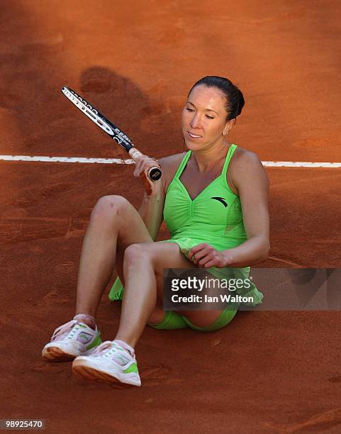 Jelena Jankovic of Serbia falls during her match against María José Martínez Sánchez of Spain during Final of the Sony Ericsson WTA Tour at the Foro...