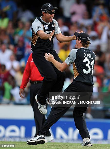 New Zealand cricketers Ross Taylor and Martin Guptill celebrate after winning the ICC World Twenty20 Super 8 match between New Zealand and Pakistan...
