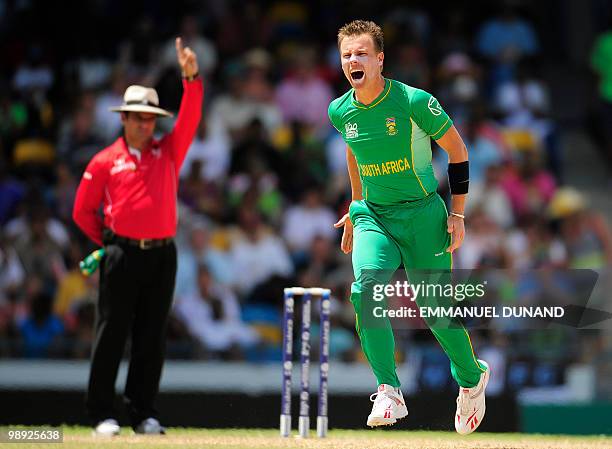 South African bowler Johan Botha celebrates after taking the wicket of English batsman Michael Lumb during the ICC World Twenty20 Super Eight match...