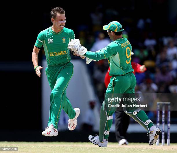 Johan Botha and Mark Boucher of South Africa celebrates the wicket of Michael Lumb during the ICC World Twenty20 Super Eight Match between England...