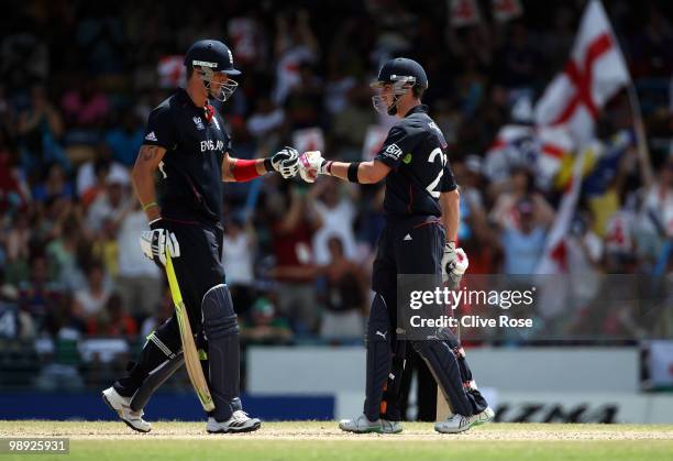 Kevin Pietersen and Craig Kieswetter of England touch gloves during the ICC World Twenty20 Super Eight match between England and South Africa at the...