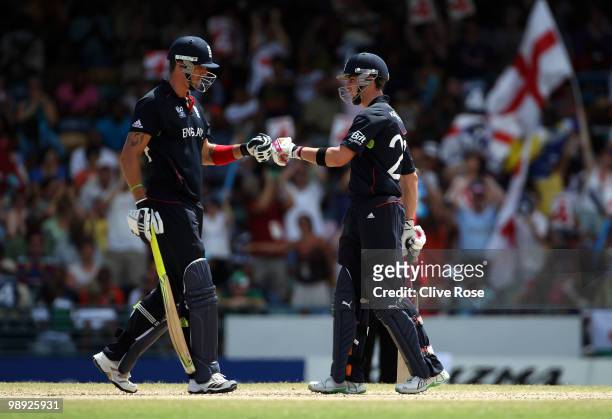 Kevin Pietersen and Craig Kieswetter of England touch gloves during the ICC World Twenty20 Super Eight match between England and South Africa at the...
