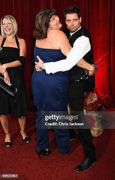 Actress Cheryl Fergison jokes with actor Keith Duffy as they attend the 2010 British Soap Awards held at the London Television Centre on May 8, 2010...