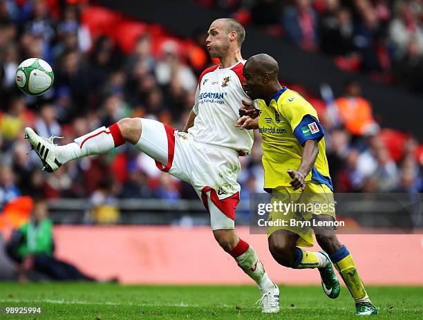 Andy Drury of Stevenage Borough holds off Paul Edwards of Barrow during the FA Carlsberg Trophy Final between Barrow and Stevenage Borough at Wembley...