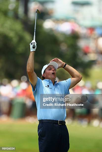 Phil Mickelson reacts as he nearly pitches in for eagle on the 16th hole during the third round of THE PLAYERS Championship held at THE PLAYERS...