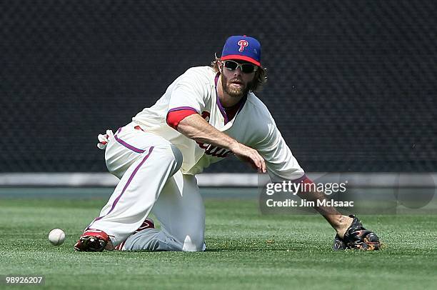 Jayson Werth of the Philadelphia Phillies fields a ball against the St. Louis Cardinals at Citizens Bank Park on May 6, 2010 in Philadelphia,...