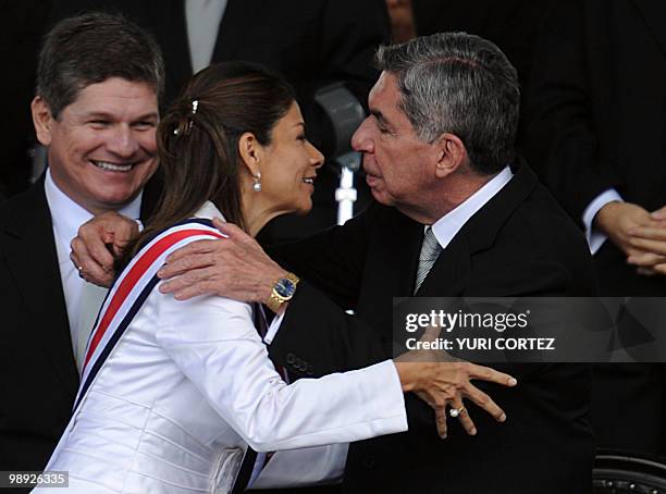 Costa Rican new President Laura Chinchilla is congratuated by outgoing president Osacr Arias , after being sworn in at La Sabana Metropolitan Park in...