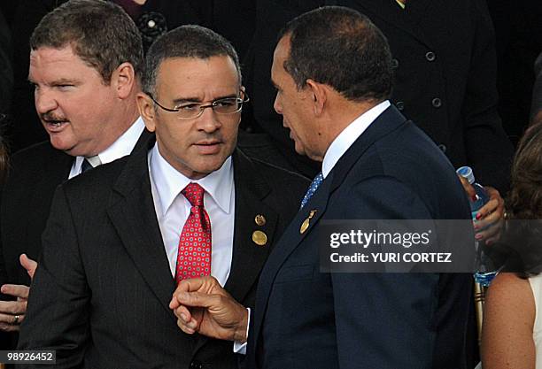 Salvadorean President Mauricio Funes listens to Honduran President Porfirio Lobo during the inauguration of Costa Rica's new President Laura...