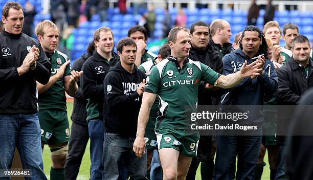 Mike Catt, of London Irish, is applauded by team mates after playing his final match in the Guinness Premiership match between London Irish and...