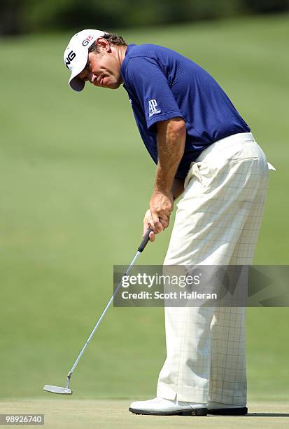 Lee Westwood of England putts on the second green during the third round of THE PLAYERS Championship held at THE PLAYERS Stadium course at TPC...