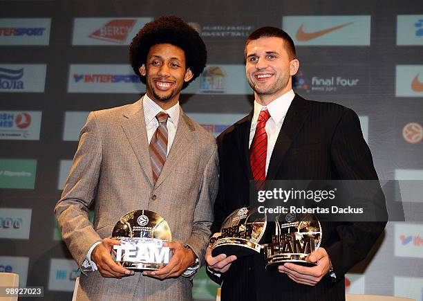 Linas Kleiza and Josh Childress pose with their awards during the Euroleague Basketball 2009-2010 Season Awards Ceremony at Hotel de Ville on May 8,...