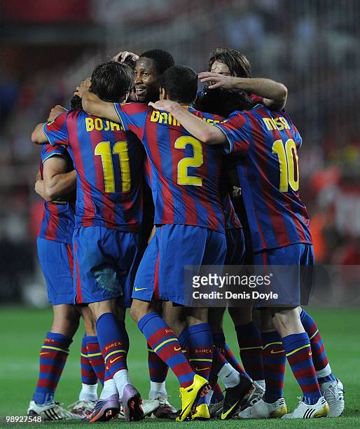 Barcelona players celebrate after scoring their 3rd goal during the La Liga match between Sevilla and Barcelona at Estadio Ramon Sanchez Pizjuan on...