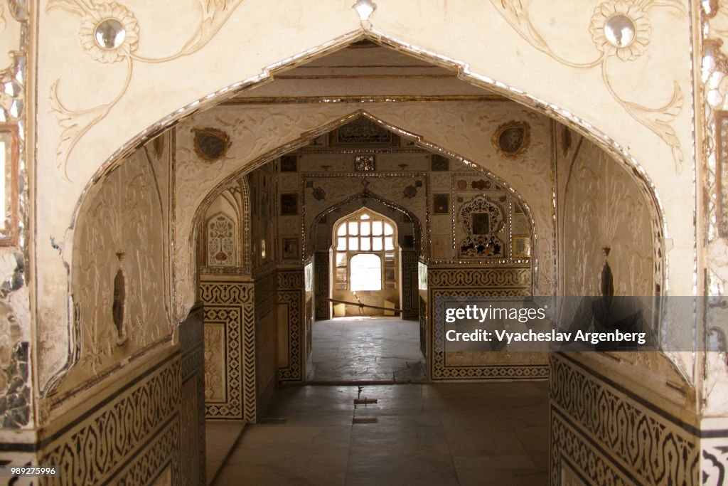 Architectural arch in Sheesh Mahal (Mirror Palace) of Amer Fort, Rajasthan, India