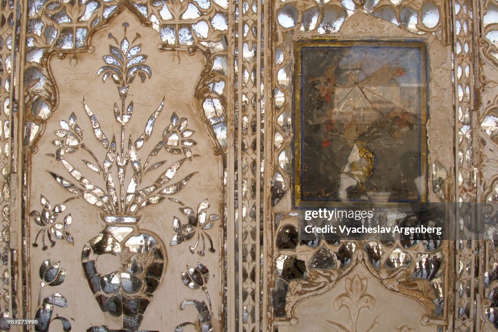 Embossed silver artwork in Sheesh Mahal (Mirror Palace) of Amer Fort, Rajasthan, India