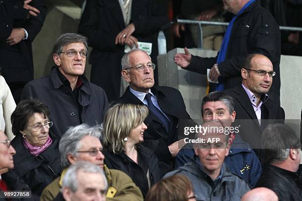 Rennes football club's former president Frederic de Saint Sernin and Rennes' new president Patrick Le Lay and Rennes' general manager Pierre Dreossi...