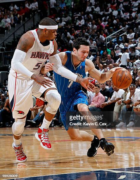Redick of the Orlando Magic drives against Josh Smith of the Atlanta Hawks during Game Three of the Eastern Conference Semifinals during the 2010 NBA...