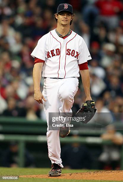 Clay Buchholz of the Boston Red Sox reacts after walking to load up the bases in the fifth inning against the New York Yankees on May 8, 2010 at...