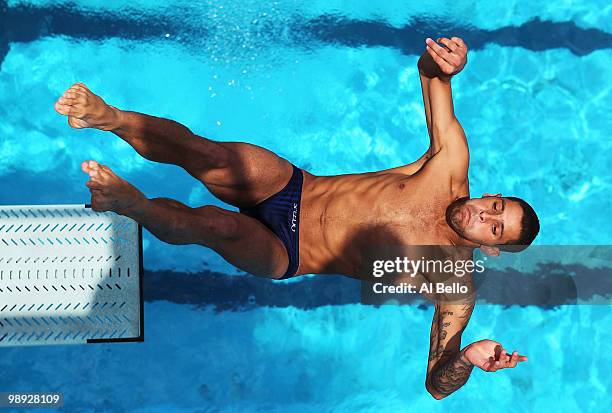 Juan Uran of Columbia dives during the Men's 3 Meter Springboard Final at the Fort Lauderdale Aquatic Center during Day 3 of the AT&T USA Diving...