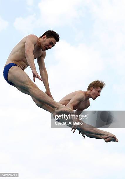 Jack Laugher and Oliver Dingley of Great Britain dive during the Men's Synchronized 3 Meter Springboard Final at the Fort Lauderdale Aquatic Center...