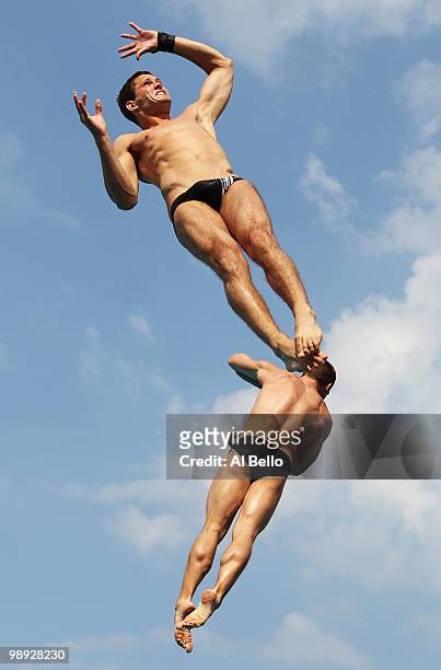 Yorick De Bruin and Ramon De Meijer of The Netherlands dive during the Men's Synchronized 3 Meter Springboard Final at the Fort Lauderdale Aquatic...
