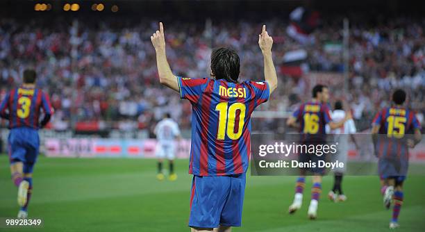 Lionel Messi of Barcelona celebrates after scoring his team's first goal during the La Liga match between Sevilla and Barcelona at Estadio Ramon...