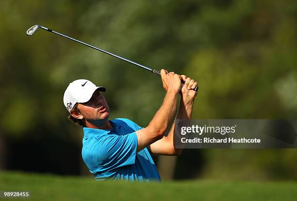 Lucas Glover plays his second shot on the 14th hole during the third round of THE PLAYERS Championship held at THE PLAYERS Stadium course at TPC...