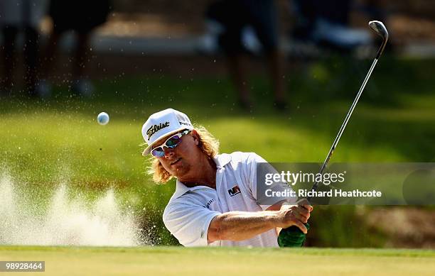 Charley Hoffman plays from a greenside bunker on the 11th during the third round of THE PLAYERS Championship held at THE PLAYERS Stadium course at...