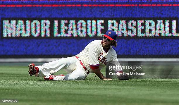 Jayson Werth of the Philadelphia Phillies fields a ball against the St. Louis Cardinals at Citizens Bank Park on May 6, 2010 in Philadelphia,...