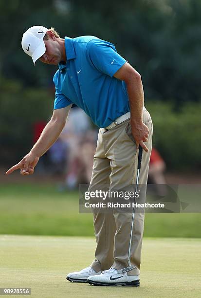 Lucas Glover reacts to his putt on the 11th green during the third round of THE PLAYERS Championship held at THE PLAYERS Stadium course at TPC...