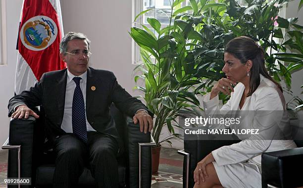 Colombian President, Alvaro Uribe, meets with Costa Rican new president, Laura Chinchilla in San Jose on May 8 after her inauguration. Social...